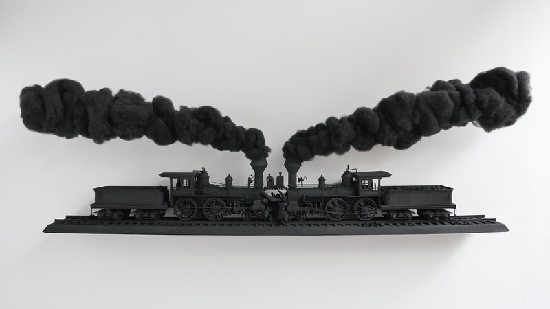 sculpture, conceptual art, model train, train crash, miniature, crash at crush, black smoke, head on collision, train art, political art, spectacle art